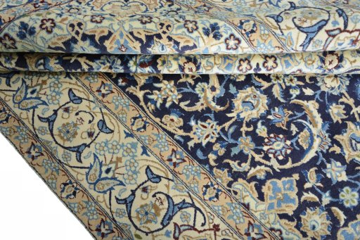 Close-up detail of 2000s Nain rug from Iran / Persia showing Wool weave