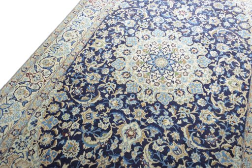 Backside of handmade 2000s Nain rug showing knot structure and weave density