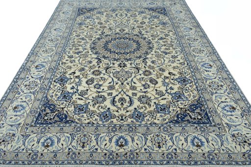 Surface texture of 2000s Nain rug with natural Wool and intricate pattern