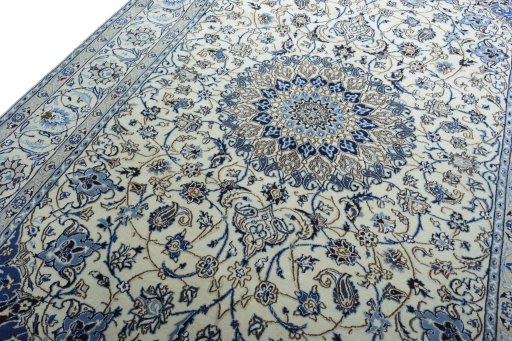 Backside of handmade 2000s Nain rug showing knot structure and weave density