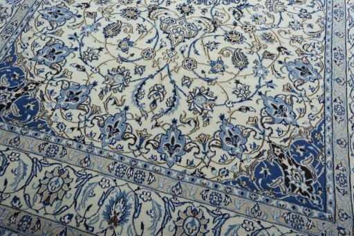 Close-up detail of 2000s Nain rug from Iran / Persia showing Wool weave