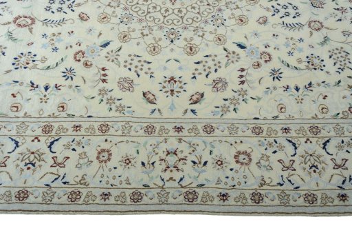 Corner detail of 2000s Nain rug showing border pattern and Wool pile
