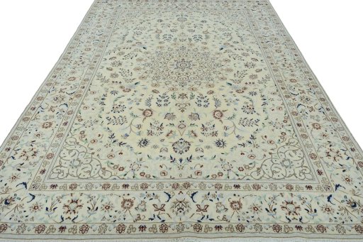 Surface texture of 2000s Nain rug with natural Wool and intricate pattern