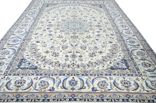 Surface texture of 2000s Nain rug with natural Wool and intricate pattern