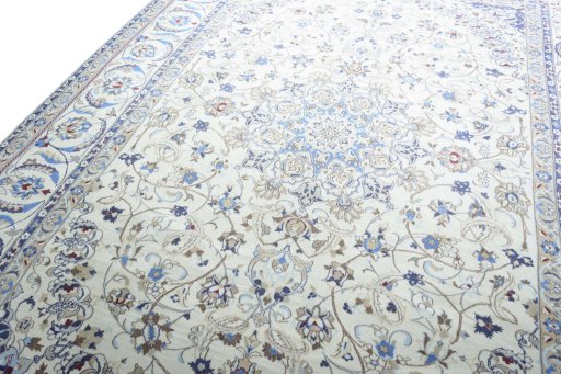Backside of handmade 2000s Nain rug showing knot structure and weave density