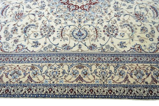 Corner detail of New Nain rug showing border pattern and Cork pile