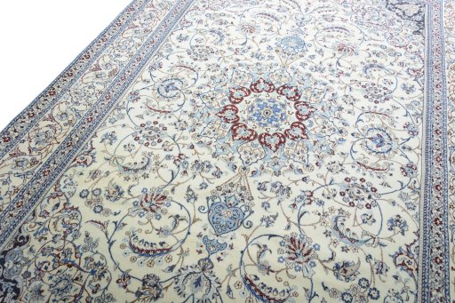 Backside of handmade New Nain rug showing knot structure and weave density