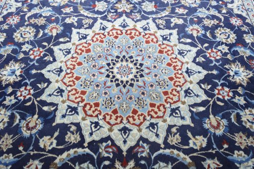 Central medallion detail of 2000s Nain rug from Iran / Persia