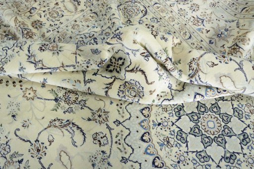 Surface texture of New Nain rug with natural Wool and intricate pattern