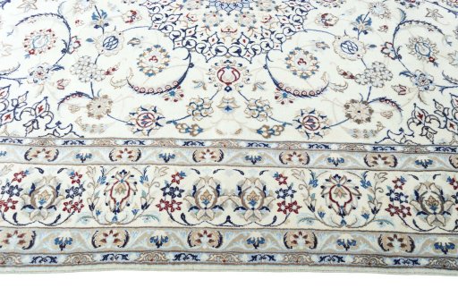 Corner detail of New Nain rug showing border pattern and Wool pile