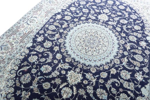 Backside of handmade New Nain rug showing knot structure and weave density