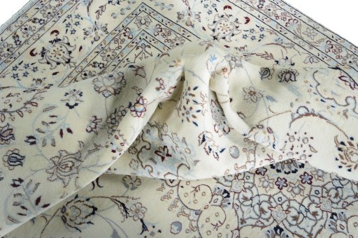 Surface texture of New Nain rug with natural Wool and intricate pattern
