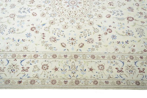 Corner detail of New Nain rug showing border pattern and Wool pile