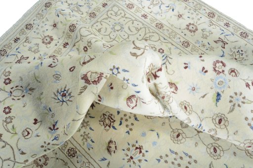 Surface texture of New Nain rug with natural Wool and intricate pattern