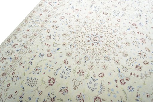 Backside of handmade New Nain rug showing knot structure and weave density