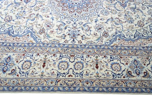 Corner detail of New Nain rug showing border pattern and Wool pile