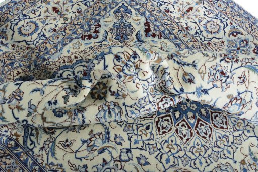 Surface texture of New Nain rug with natural Wool and intricate pattern