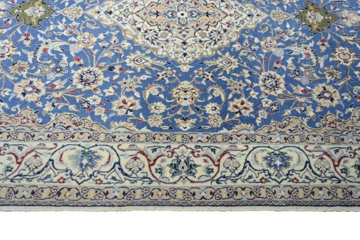 Corner detail of New Nain rug showing border pattern and Cork pile