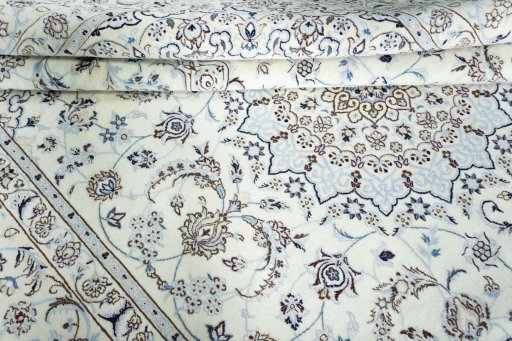 Close-up detail of New Nain rug from Iran / Persia showing Wool weave