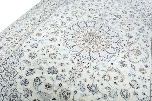 Backside of handmade New Nain rug showing knot structure and weave density