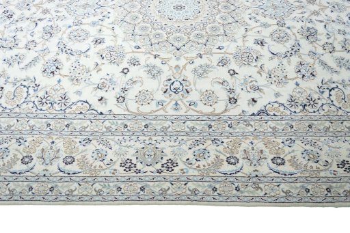 Corner detail of New Nain rug showing border pattern and Wool pile