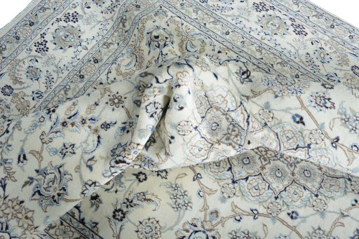 Surface texture of New Nain rug with natural Wool and intricate pattern