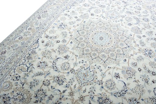 Backside of handmade New Nain rug showing knot structure and weave density