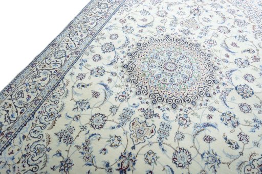 Backside of handmade New Nain rug showing knot structure and weave density