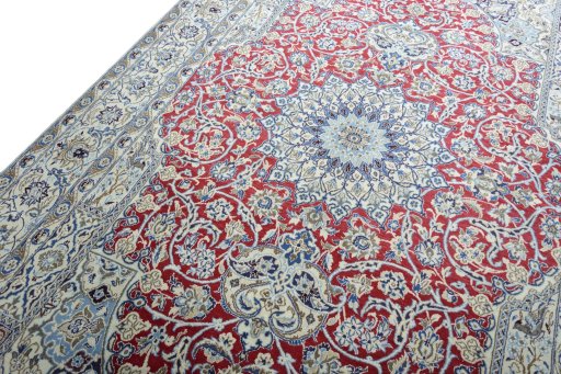Backside of handmade 2000s Nain rug showing knot structure and weave density