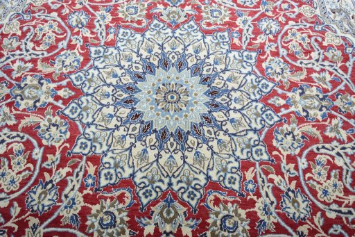 Central medallion detail of 2000s Nain rug from Iran / Persia