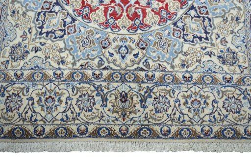 Full view of 2000s Nain rug from Iran / Persia, 312 × 200 cm in Red tones