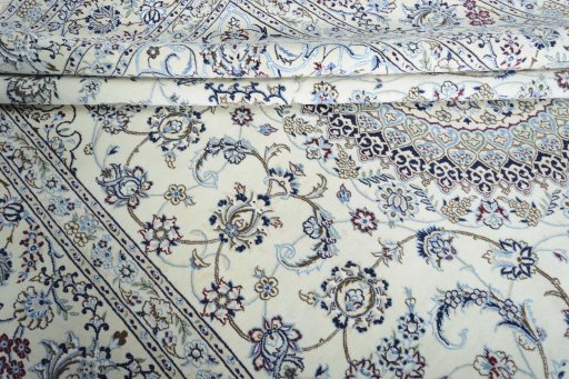 Corner detail of New Nain rug showing border pattern and Wool pile
