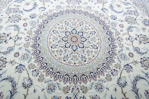Backside of handmade New Nain rug showing knot structure and weave density