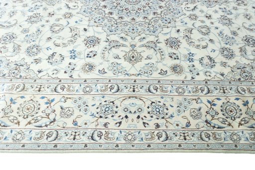 Corner detail of New Nain rug showing border pattern and Wool pile