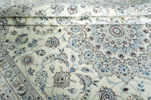Close-up detail of New Nain rug from Iran / Persia showing Wool weave