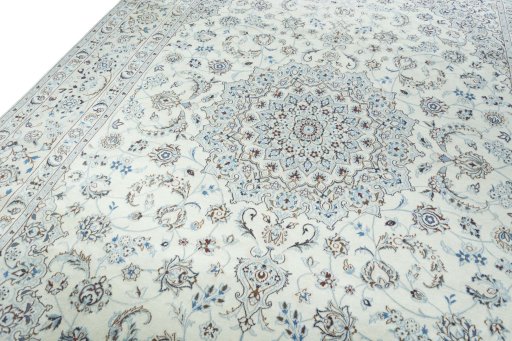 Backside of handmade New Nain rug showing knot structure and weave density