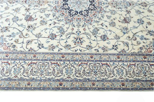 Corner detail of New Nain rug showing border pattern and Cork pile