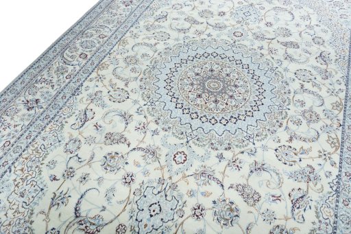 Backside of handmade New Nain rug showing knot structure and weave density
