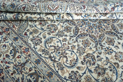 Close-up detail of New Nain rug from Iran / Persia showing Wool weave