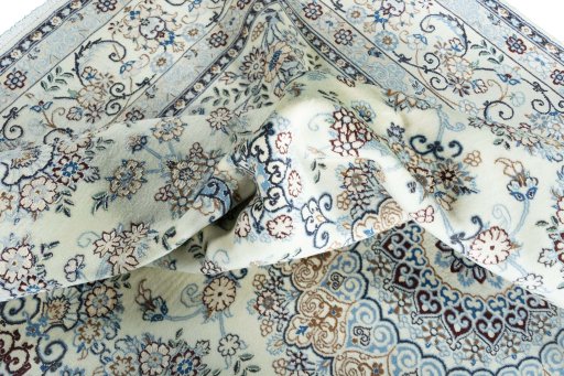 Surface texture of New Nain rug with natural Wool and intricate pattern