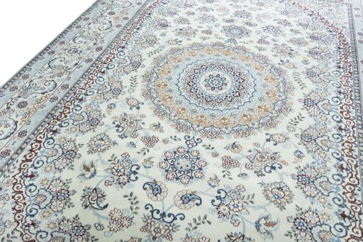 Backside of handmade New Nain rug showing knot structure and weave density