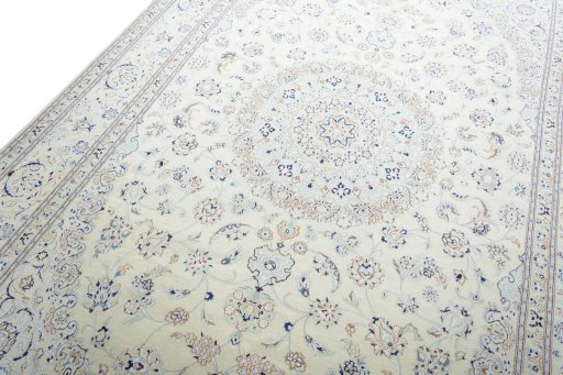 Backside of handmade New Nain rug showing knot structure and weave density