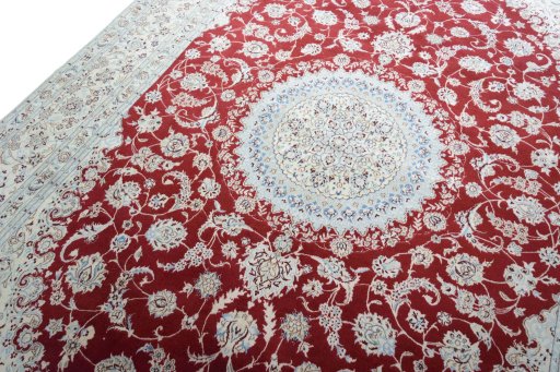 Backside of handmade New Nain rug showing knot structure and weave density