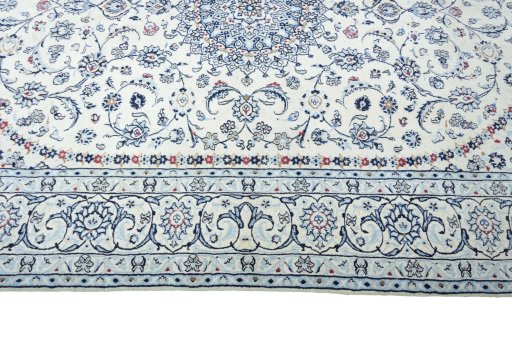 Corner detail of New Nain rug showing border pattern and Wool pile