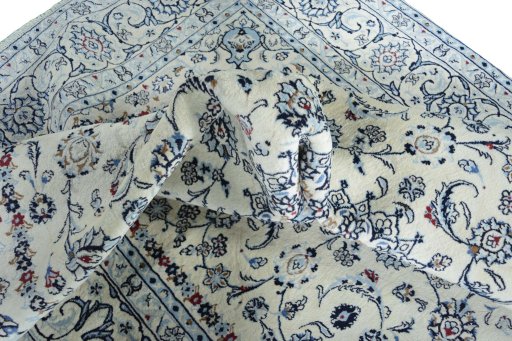 Surface texture of New Nain rug with natural Wool and intricate pattern