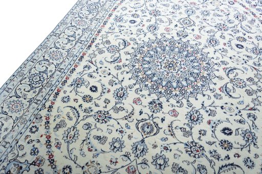 Backside of handmade New Nain rug showing knot structure and weave density