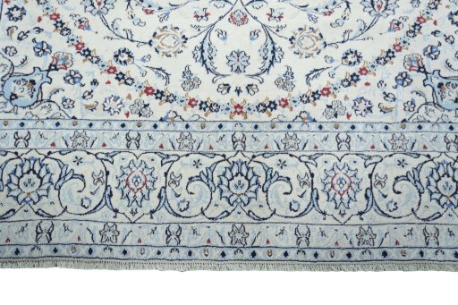 Full view of New Nain rug from Iran / Persia, 278 × 199 cm in Beige tones