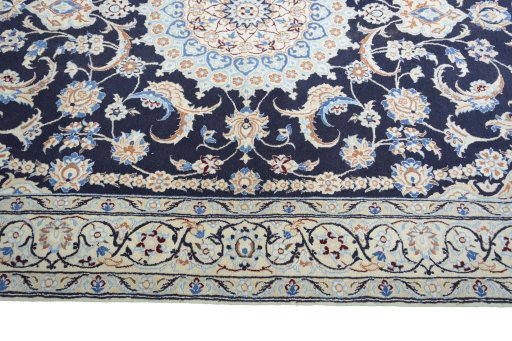 Corner detail of New Nain rug showing border pattern and Wool pile