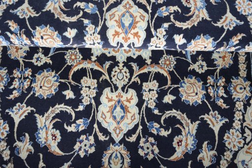 Close-up detail of New Nain rug from Iran / Persia showing Wool weave