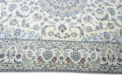 Corner detail of New Nain rug showing border pattern and Wool pile